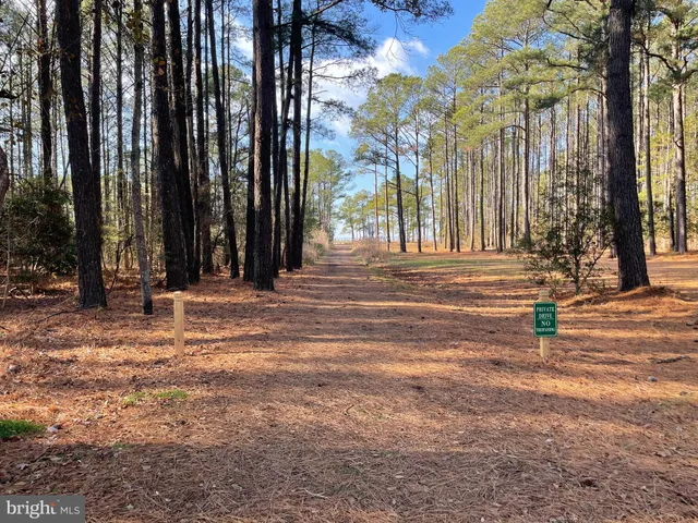 a view of a houses with a street