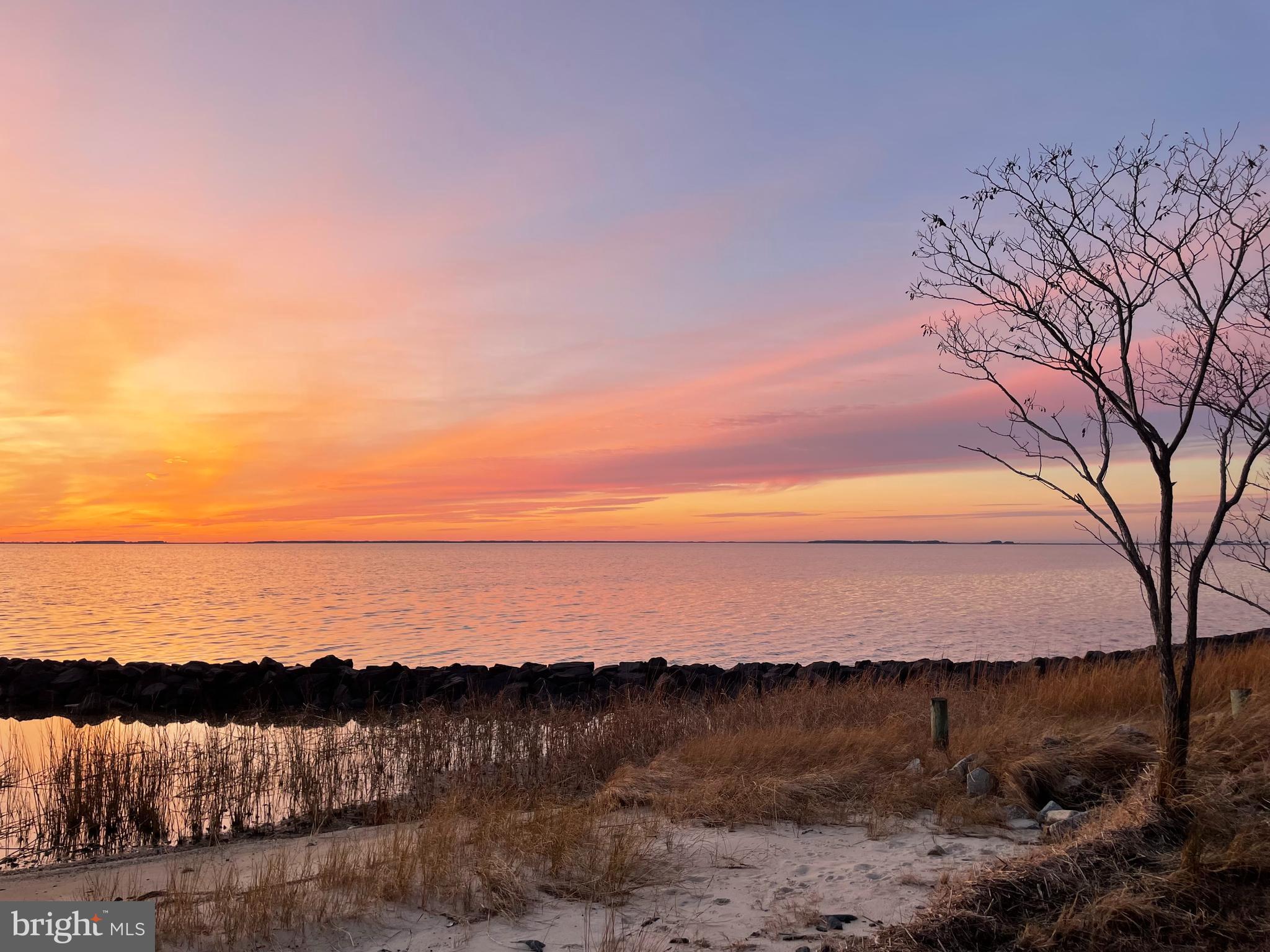 20160 Nanticoke Road Nanticoke, MD 21840 - Photo 4 of 21 a view of lake with sunset