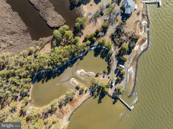 a view of a lake with a yard