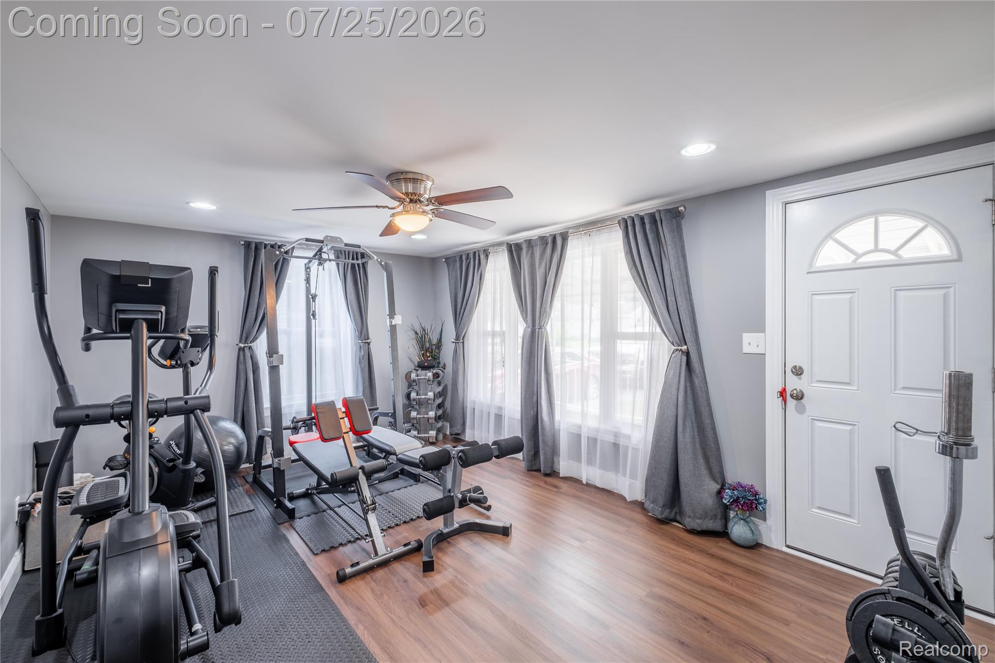 4057 Risedorph Street Burton, MI 48509 - Photo 17 of 23 Interior room featuring wood-finish flooring, recessed lighting, and a ceiling fan with integrated light