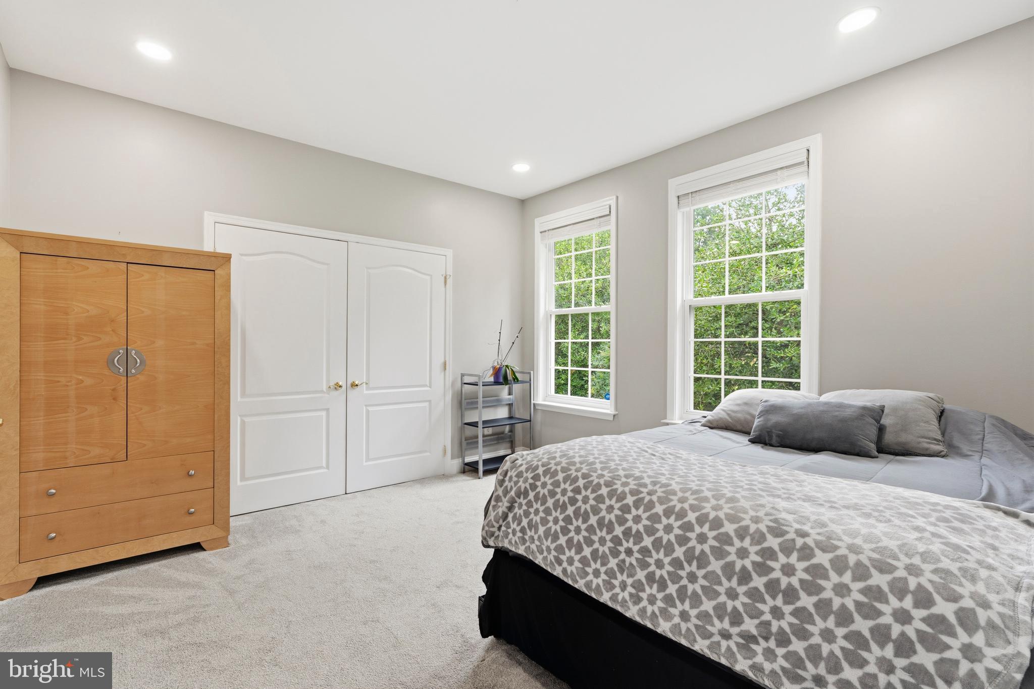 13305 Old Fort Road Fort Washington, MD 20744 - Photo 23 of 65 a bedroom with a large bed and a window