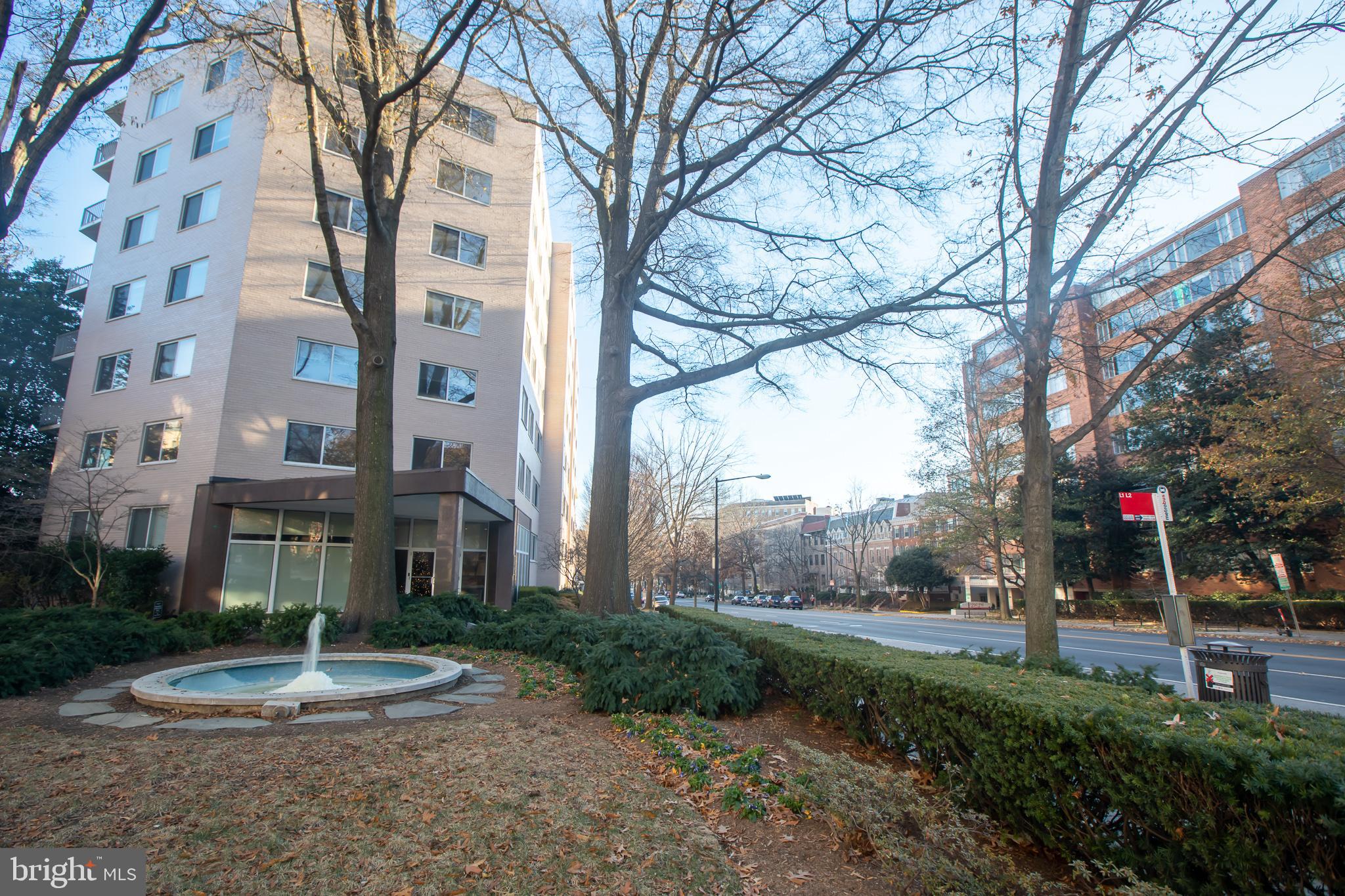 a view of a building with a yard