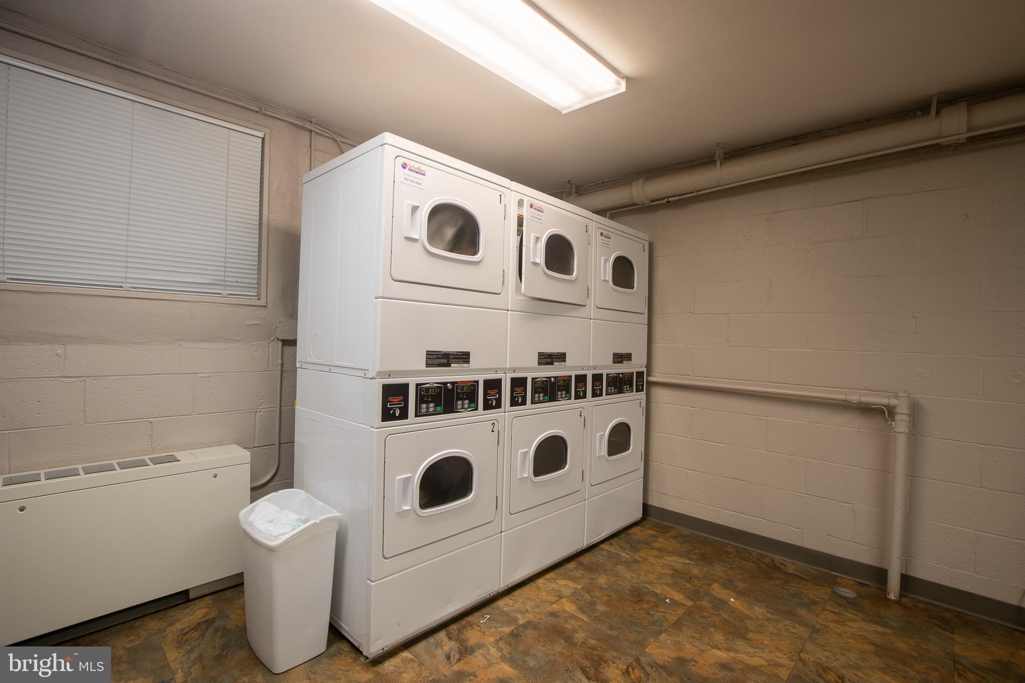 2829 Connecticut Avenue Northwest, Unit 505 Washington, DC 20008 - Photo 14 of 17 a utility room with dryer and washer