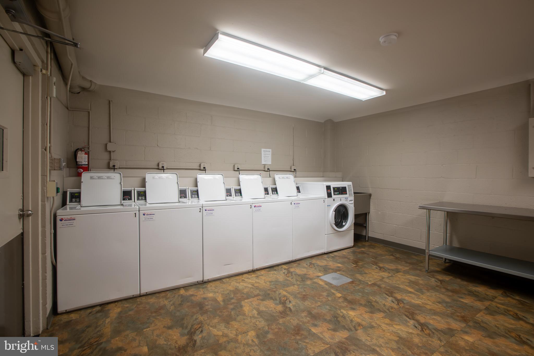 2829 Connecticut Avenue Northwest, Unit 505 Washington, DC 20008 - Photo 15 of 17 a utility room with dryer and washer