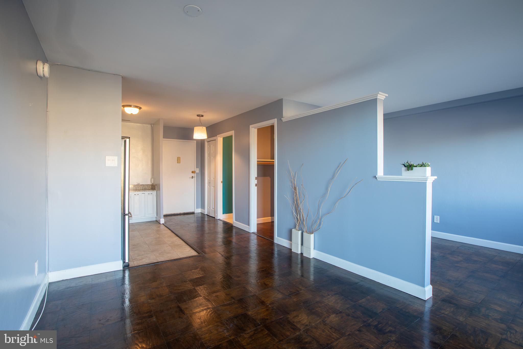 2829 Connecticut Avenue Northwest, Unit 505 Washington, DC 20008 - Photo 9 of 17 a view of a hallway with wooden floor