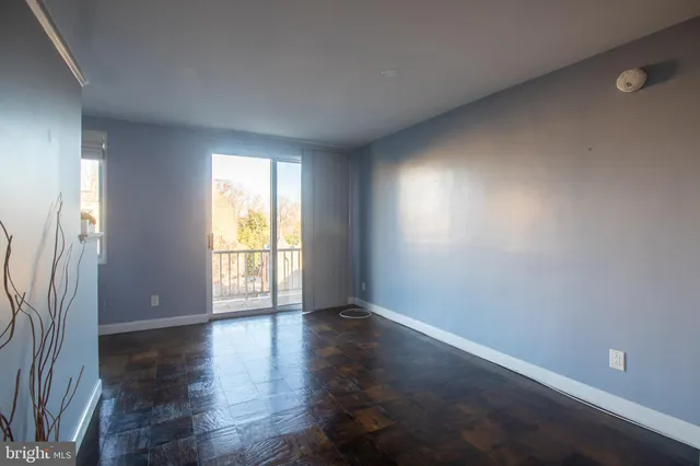 a kitchen with stainless steel appliances granite countertop a refrigerator a stove a sink and a microwave