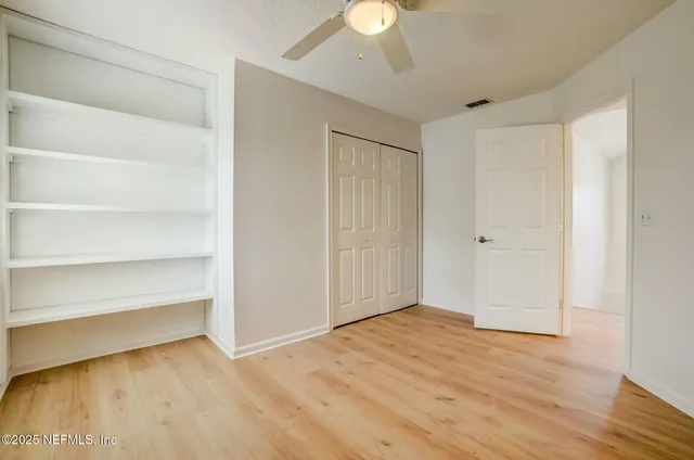 a view of a lake with a big yard