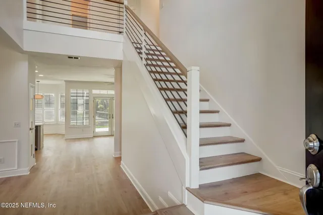 a kitchen with granite countertop a stove and a sink