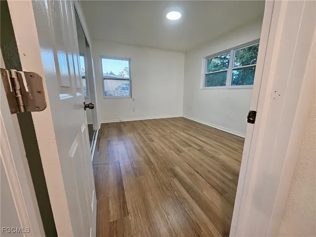 a view of entryway with wooden floor