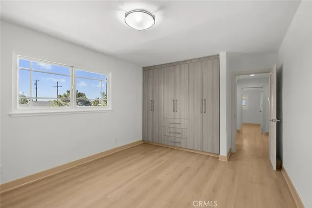 a view of kitchen with wooden floor