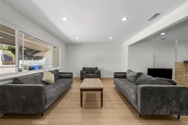 a living room with furniture and a couch