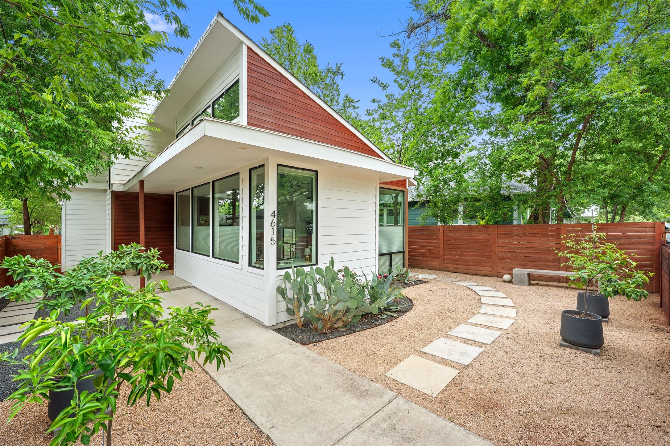 4615 Depew Avenue Austin, TX 78751 - Photo 1 of 40 Front of home with native landscaping and gated front yard