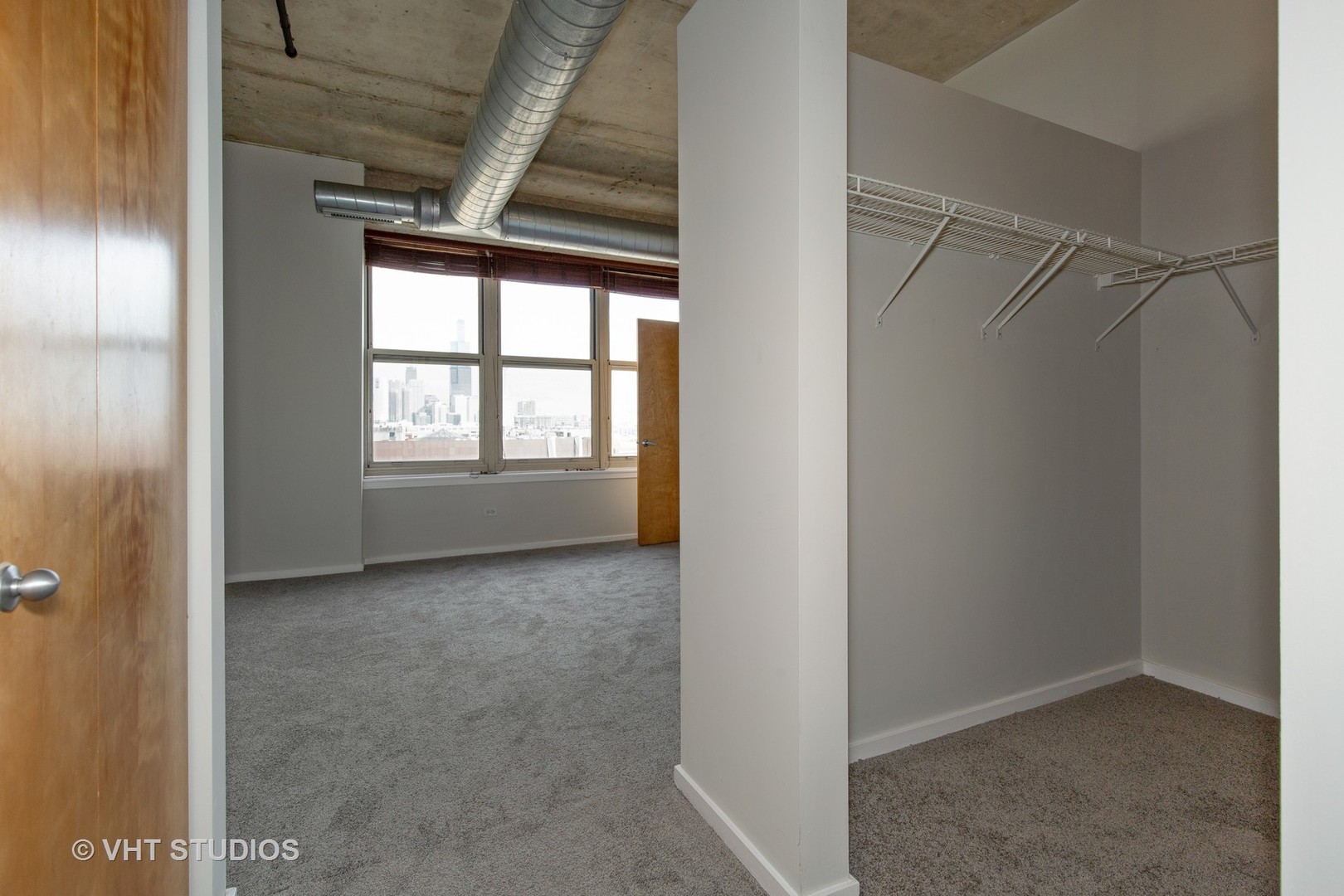 6 South Laflin Street, Unit 807S Chicago, IL 60607 - Photo 11 of 18 a view of an empty room with a window