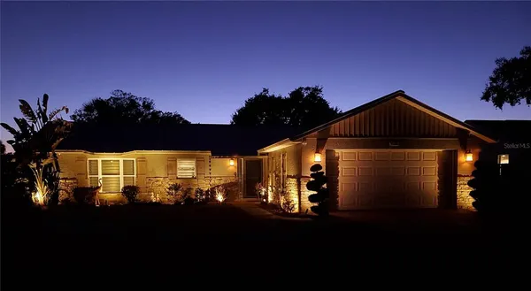 a view of a back yard of the house