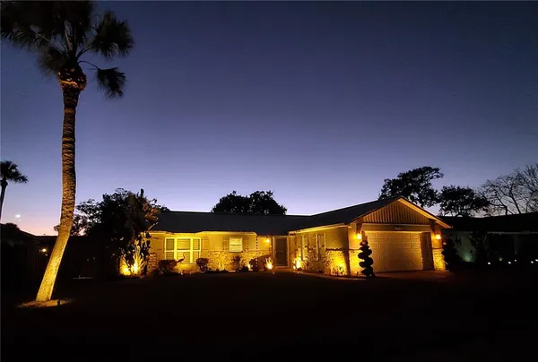 a view of a houses with a swimming pool