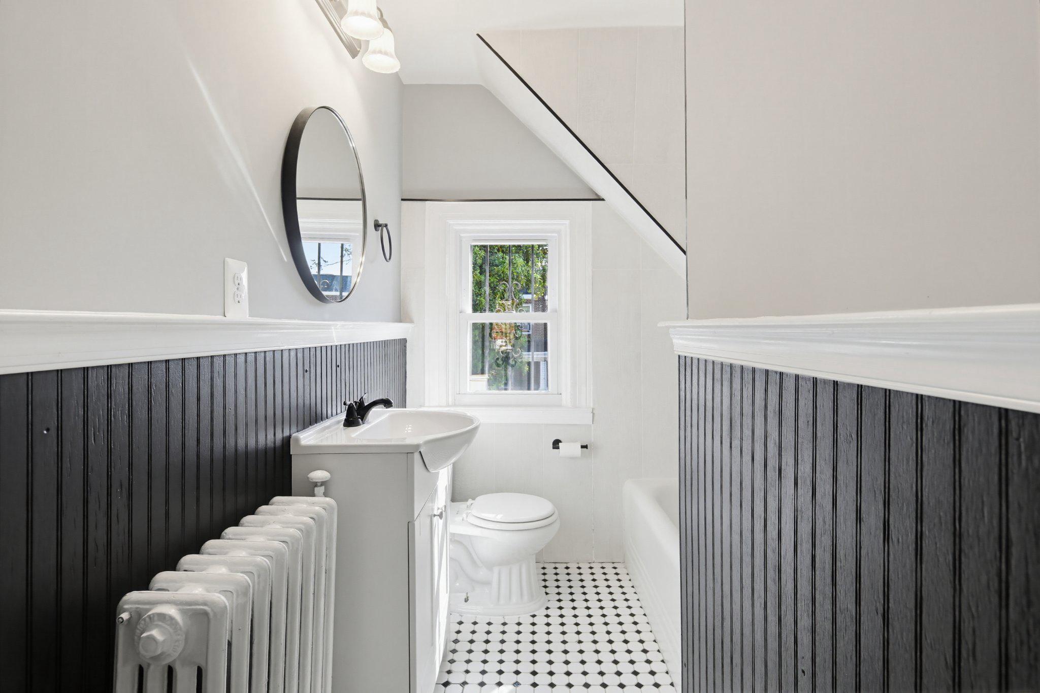 12 North Rosedale Street Baltimore, MD 21229 - Photo 9 of 25 Charming full bathroom with classic accents.
