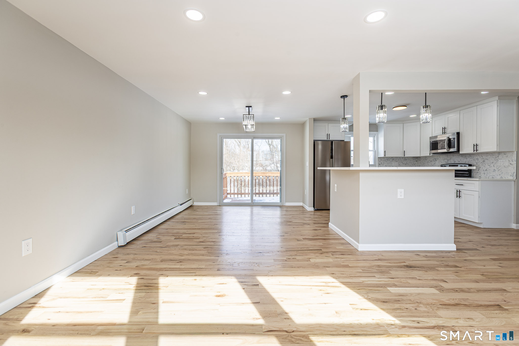 73 Abbe Road Windsor, CT 06095 - Photo 29 of 40 Living Room and Dining Room Open concept