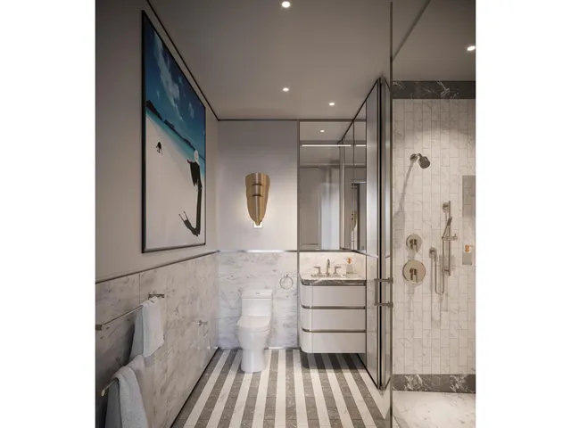 a en suite bathroom with a tub and a large window