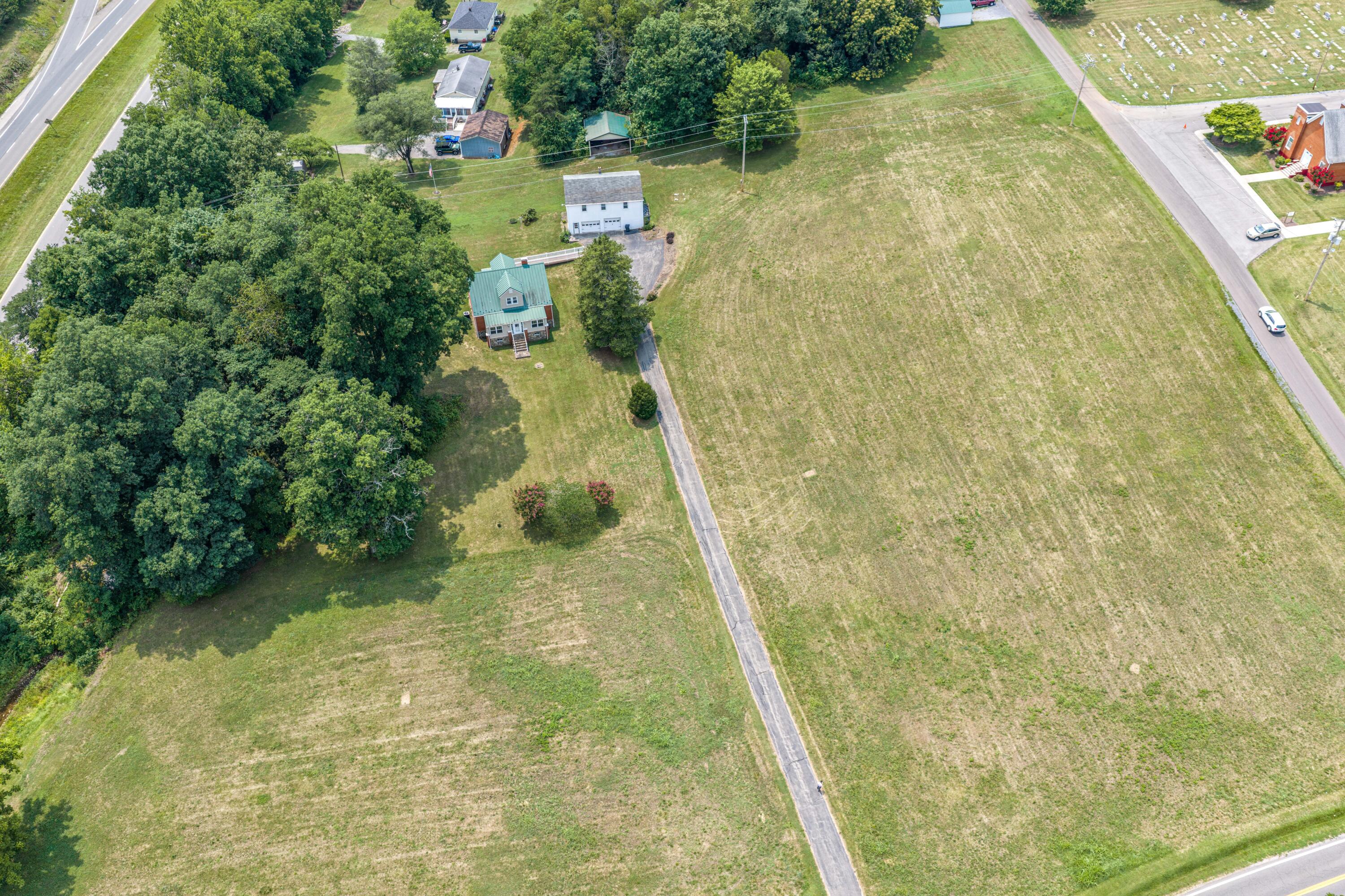 77 Mountain Pass Road Blue Ridge, VA 24064 - Photo 4 of 25 a aerial view of a residential houses with yard
