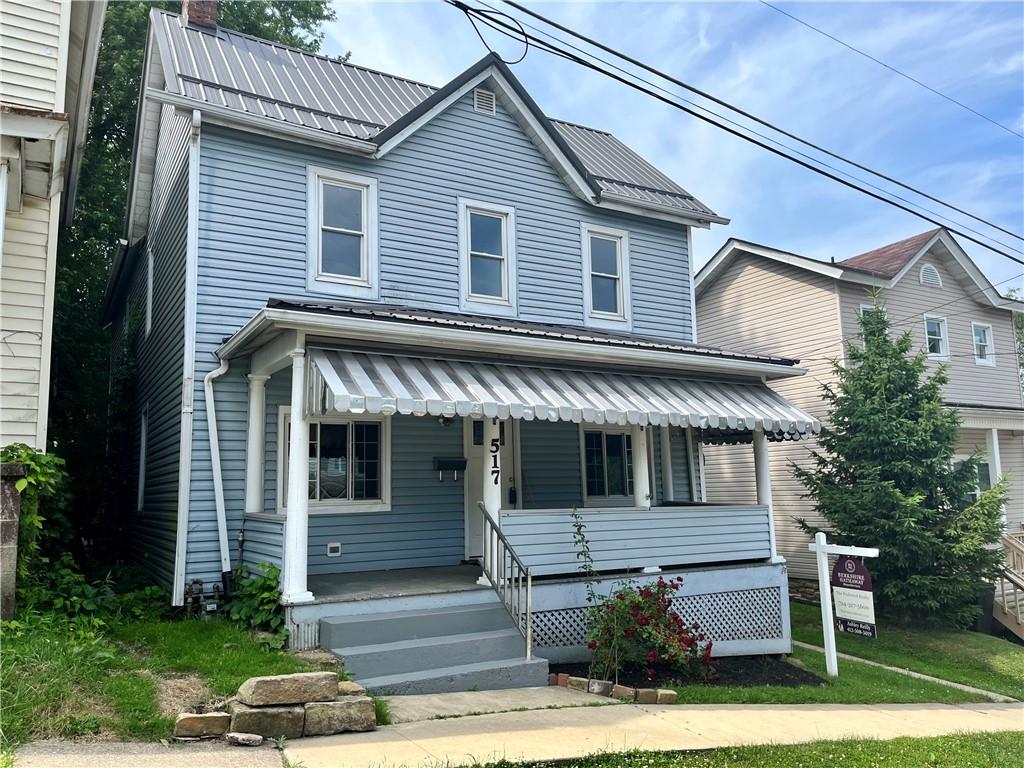 517 North 4th Street Apollo, PA 15613 - Photo 2 of 27 a front view of a house with a porch