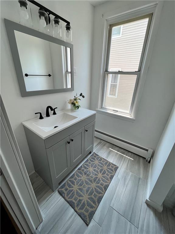 517 North 4th Street Apollo, PA 15613 - Photo 9 of 27 a bathroom with a sink mirror and a bathtub