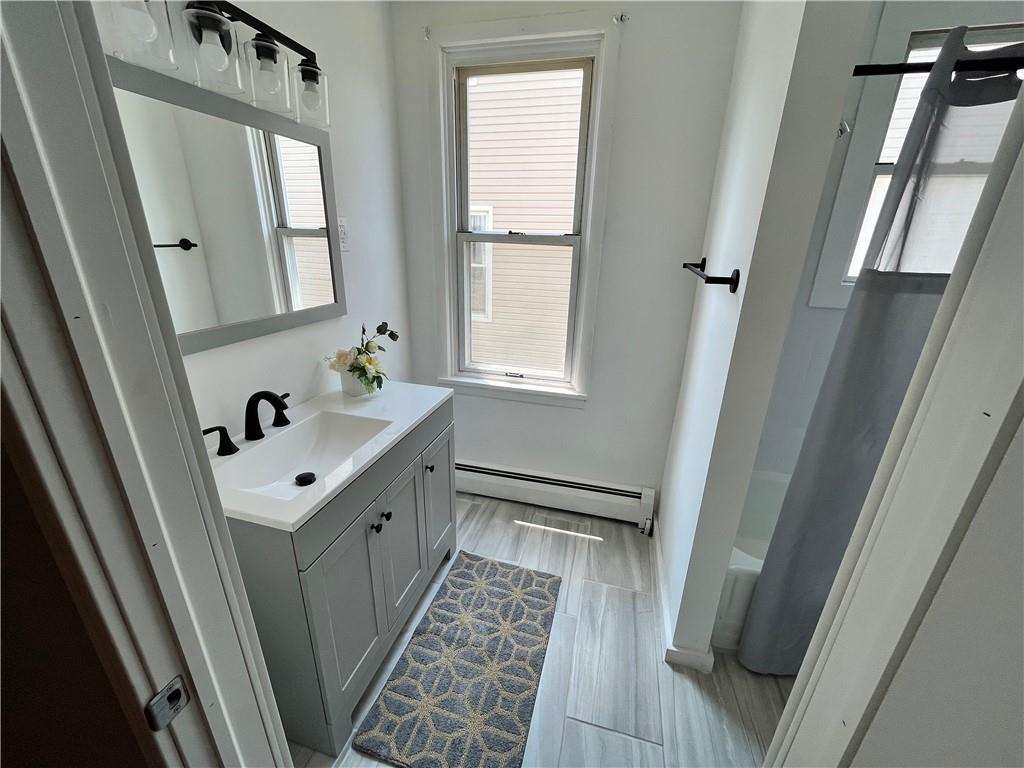 517 North 4th Street Apollo, PA 15613 - Photo 10 of 27 a bathroom with double vanity sink and a mirror