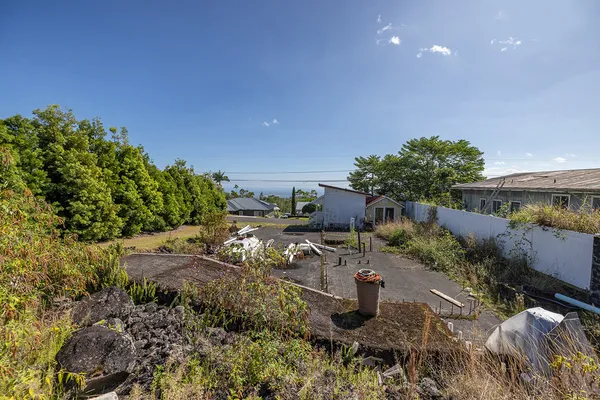 a garden view with a seating space