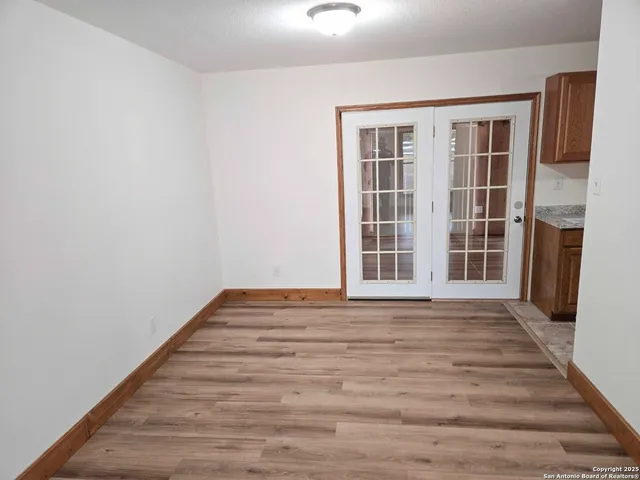 a bathroom with a sink toilet and mirror