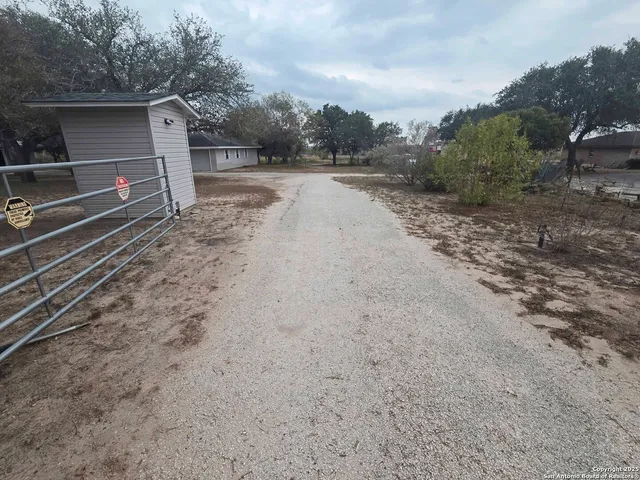 a view of outdoor space with deck and yard