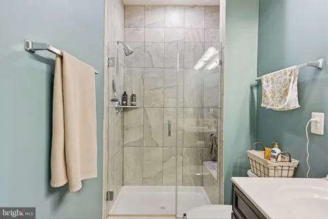 a bathroom with a sink and a shower