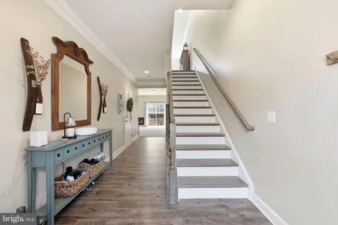 a view of a hallway with staircase