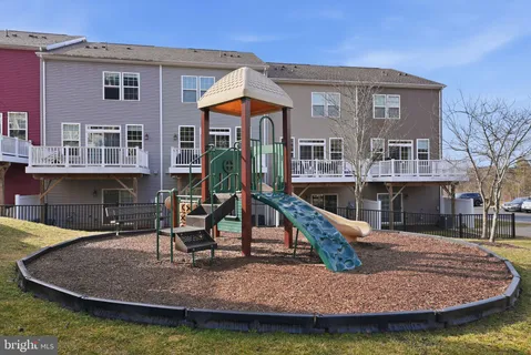 a view of a house with swimming pool
