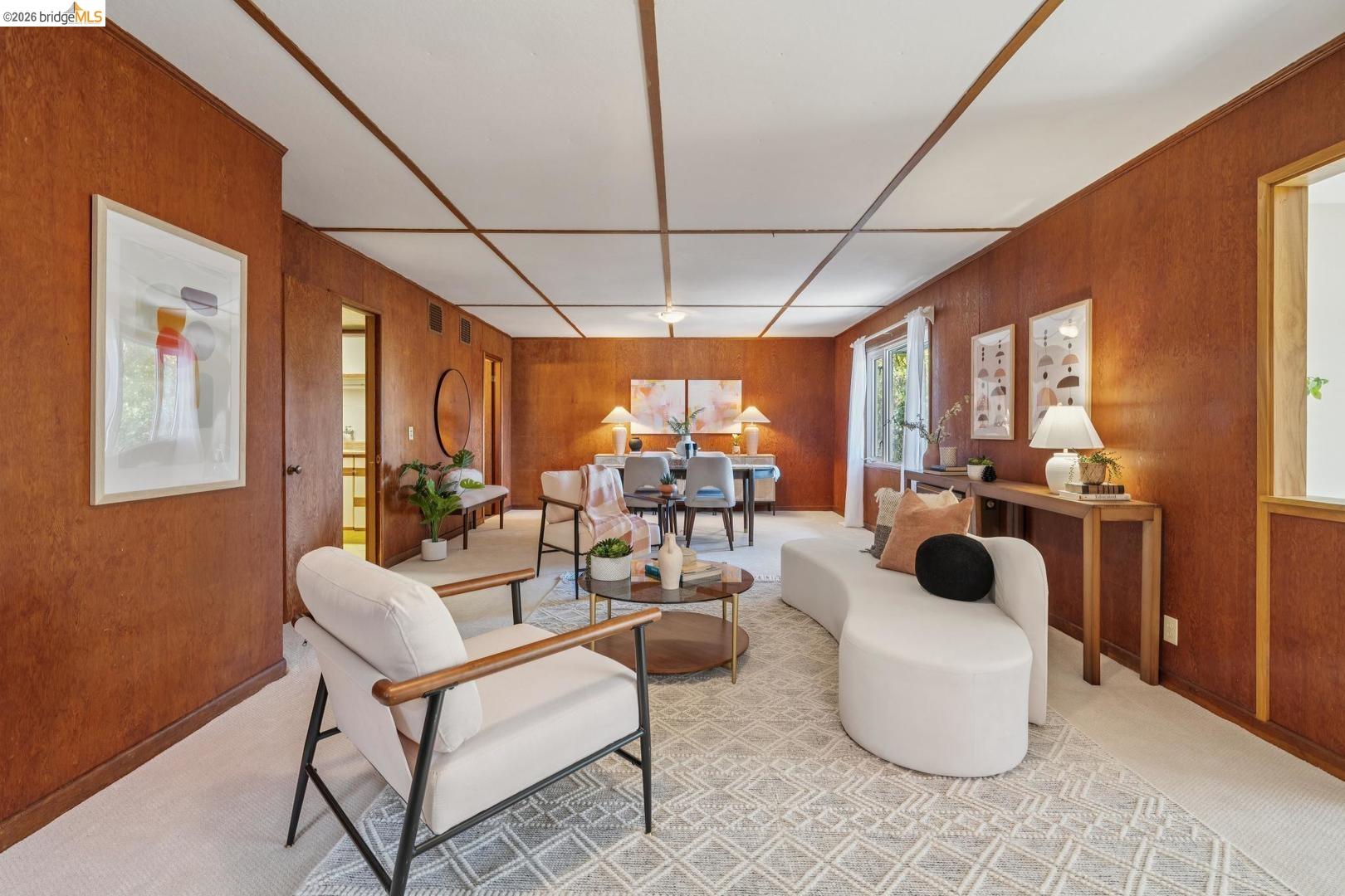 155 Avenida Drive Berkeley, CA 94708 - Photo 46 of 86 Wood panel walls, recessed window, and white ceiling with wood trim