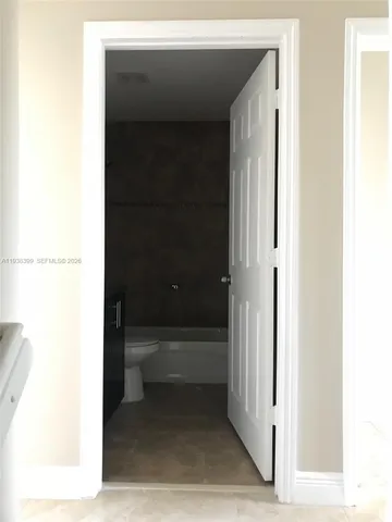 a view of a bathroom with closet