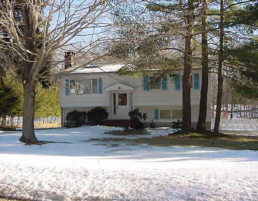 79 Ashbee Lane Ridgefield, CT 06877 - Photo 1 of 1 a view of a house with a patio