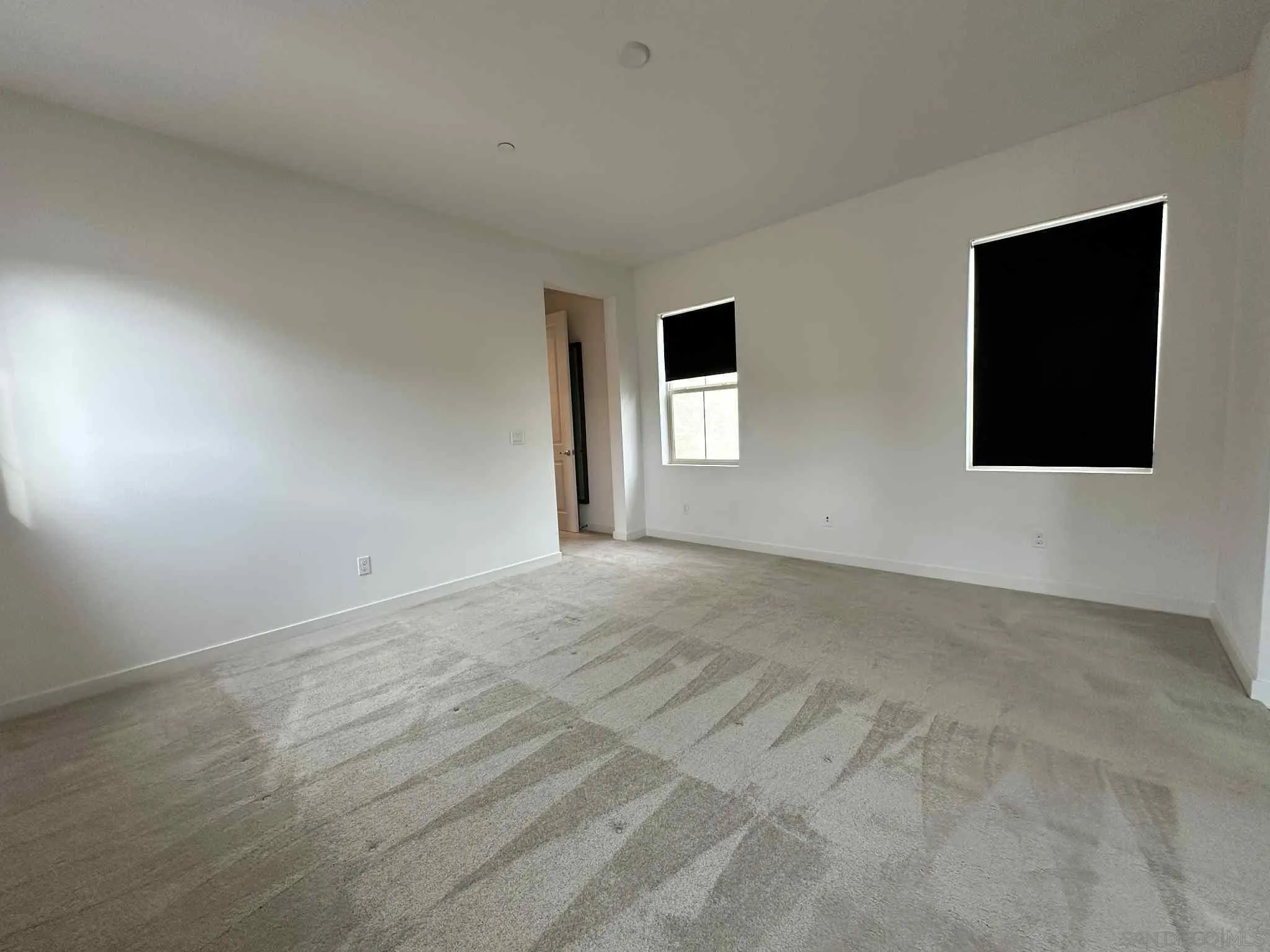 1958 P.º Lugo Chula Vista, CA 91913 - Photo 17 of 68 a view of an empty room with window and closet area