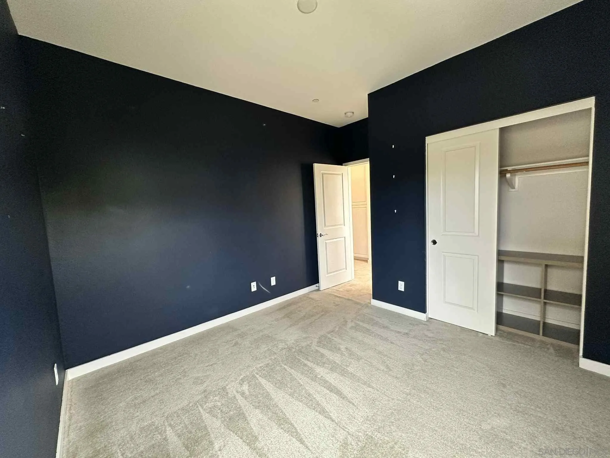 1958 P.º Lugo Chula Vista, CA 91913 - Photo 29 of 68 a view of an empty room with closet and a window