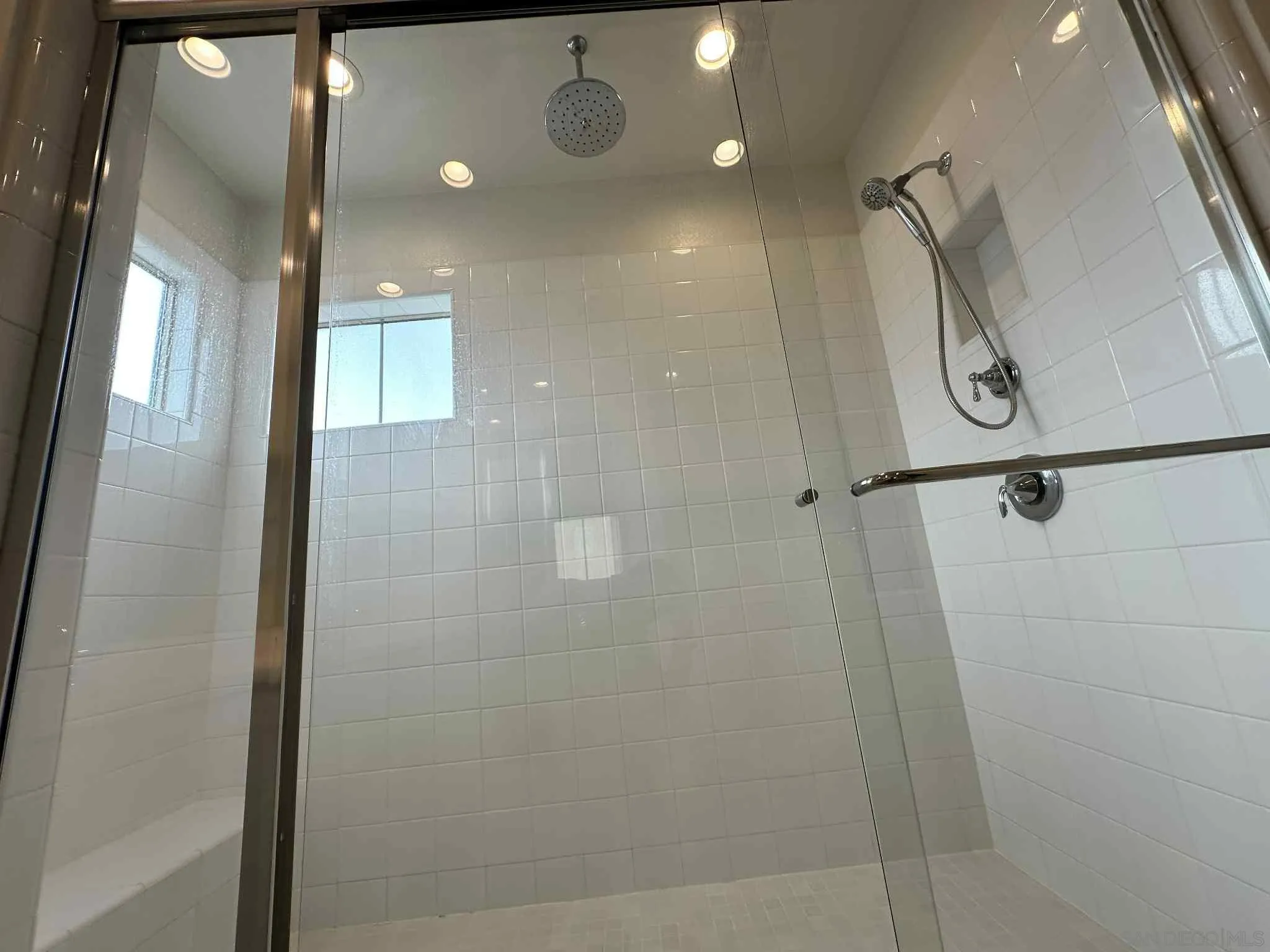 1958 P.º Lugo Chula Vista, CA 91913 - Photo 33 of 68 a bathroom with a shower and a mirror