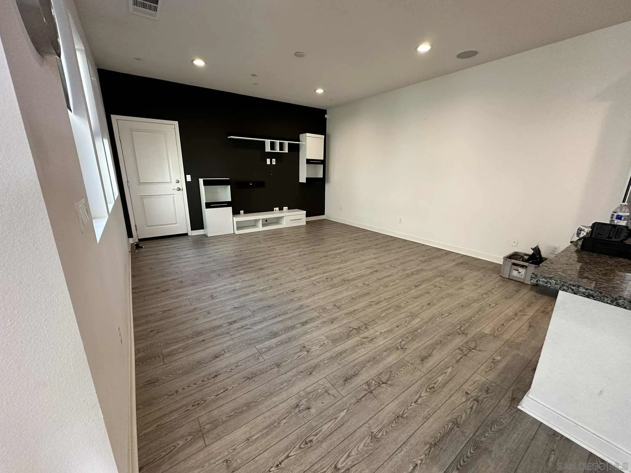 1958 P.º Lugo Chula Vista, CA 91913 - Photo 36 of 68 an empty room with wooden floor and windows
