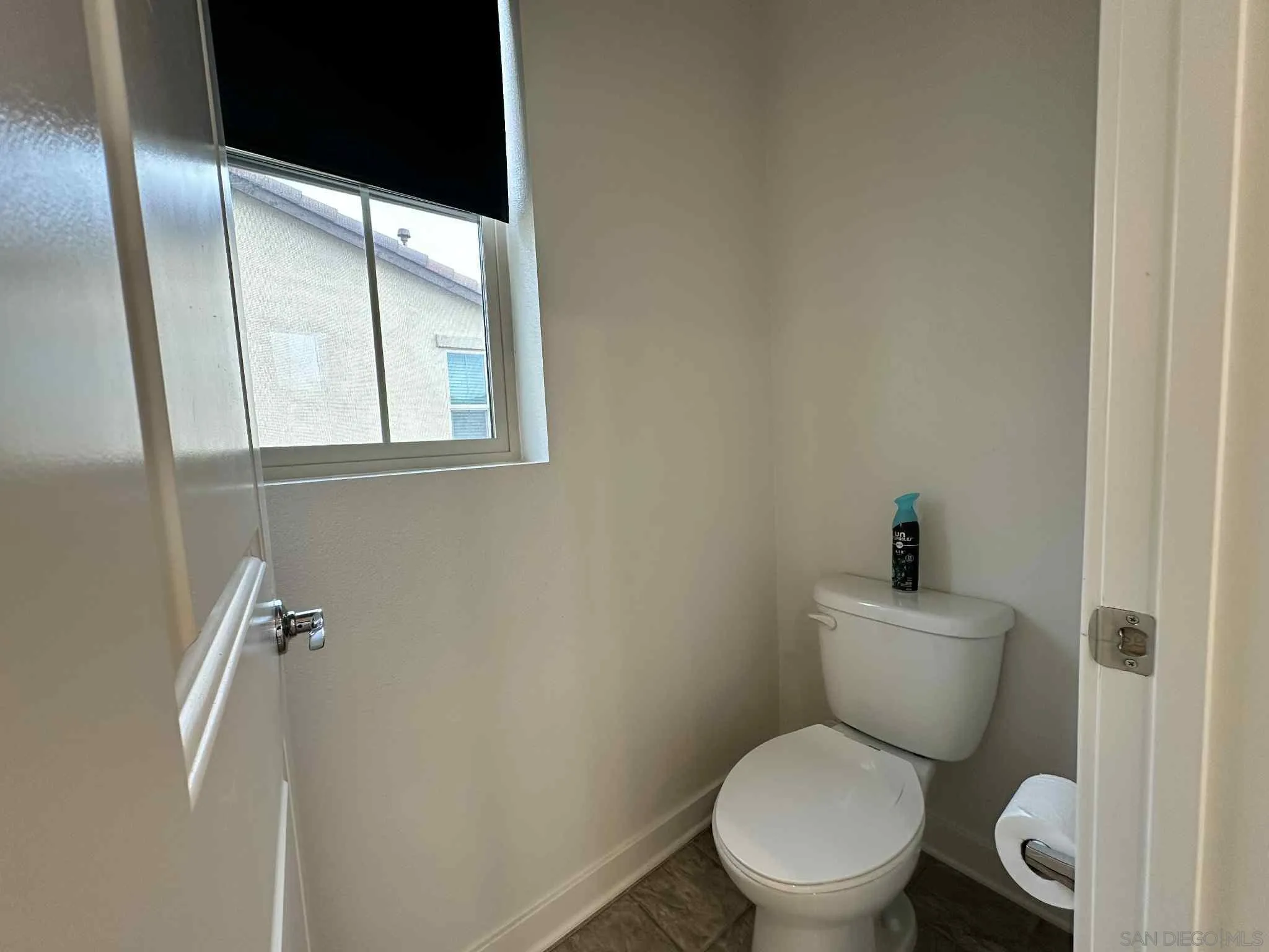 1958 P.º Lugo Chula Vista, CA 91913 - Photo 53 of 68 a white toilet sitting next to a bathroom sink