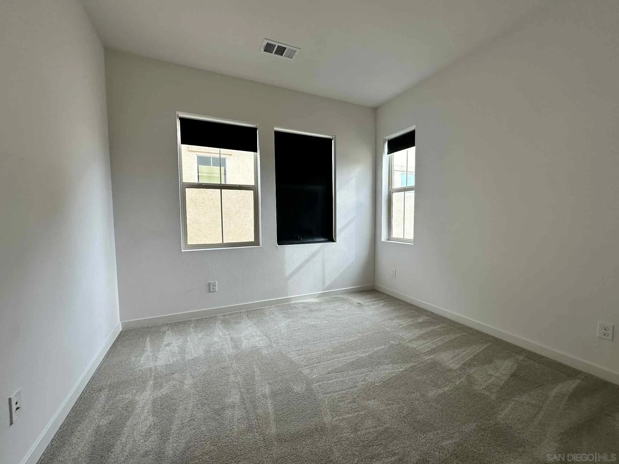 1958 P.º Lugo Chula Vista, CA 91913 - Photo 7 of 68 an empty room with windows