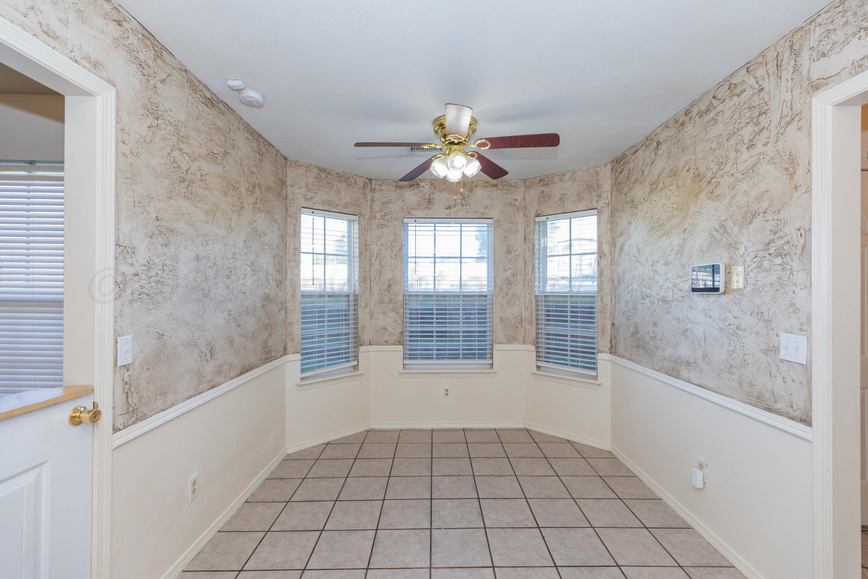 5230 Royce Drive Amarillo, TX 79110 - Photo 14 of 57 a view of an empty room and window