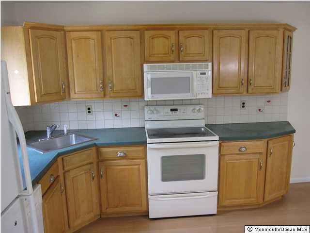 334 Diamond Road Jackson, NJ 08527 - Photo 3 of 3 a kitchen with cabinets appliances and a sink