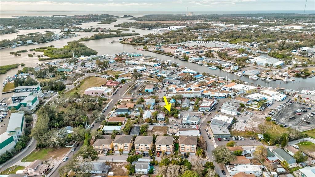 Athens Street Tarpon Springs, FL 34689 - Photo 7 of 20 an aerial view of residential building and parking space
