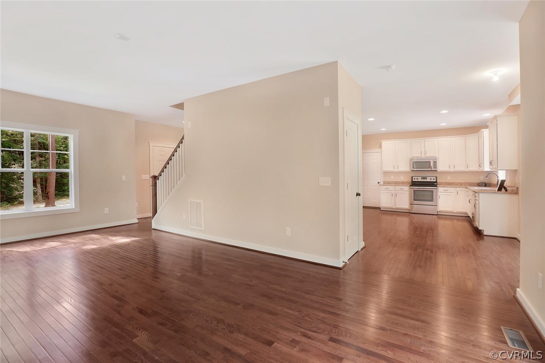 19410 River Road Chesterfield, VA 23838 - Photo 12 of 32 a view of a kitchen with wooden floor and a window