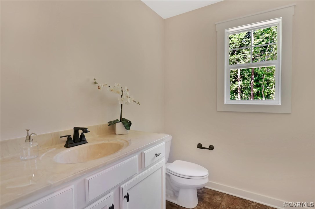 19410 River Road Chesterfield, VA 23838 - Photo 24 of 32 a bathroom with a sink and a toilet