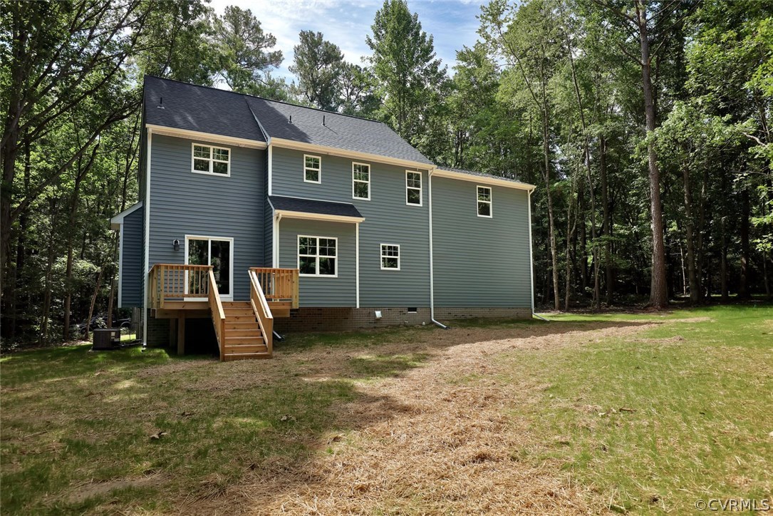 19410 River Road Chesterfield, VA 23838 - Photo 29 of 32 a view of a house with backyard and a tree