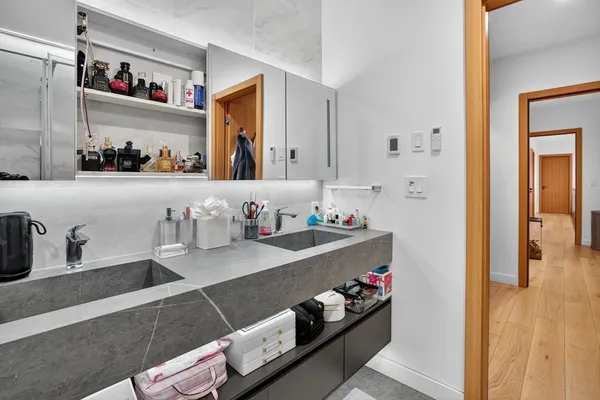 a kitchen with a sink and cabinets