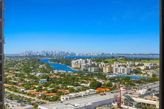 a view of a city with ocean view