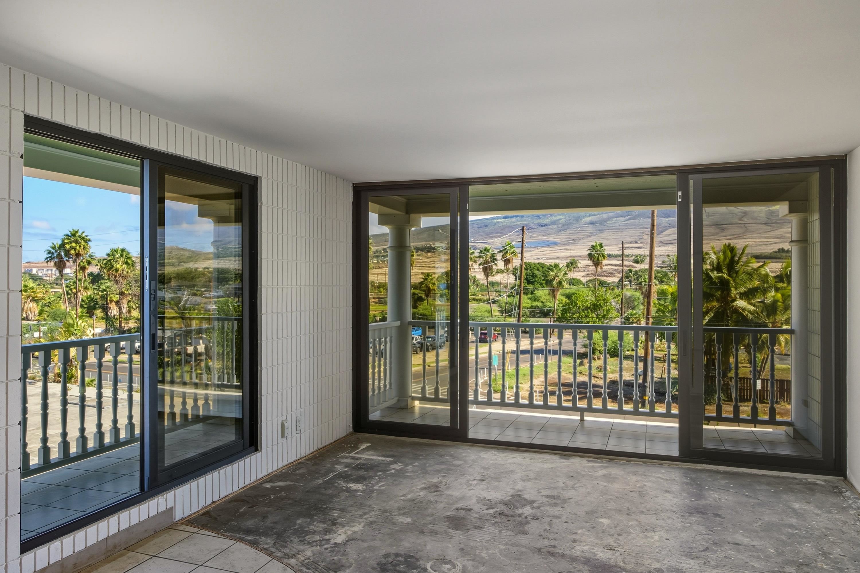 475 Front Street, Unit 334 Lahaina, HI 96761 - Photo 19 of 36 a view of an empty room with glass door and balcony